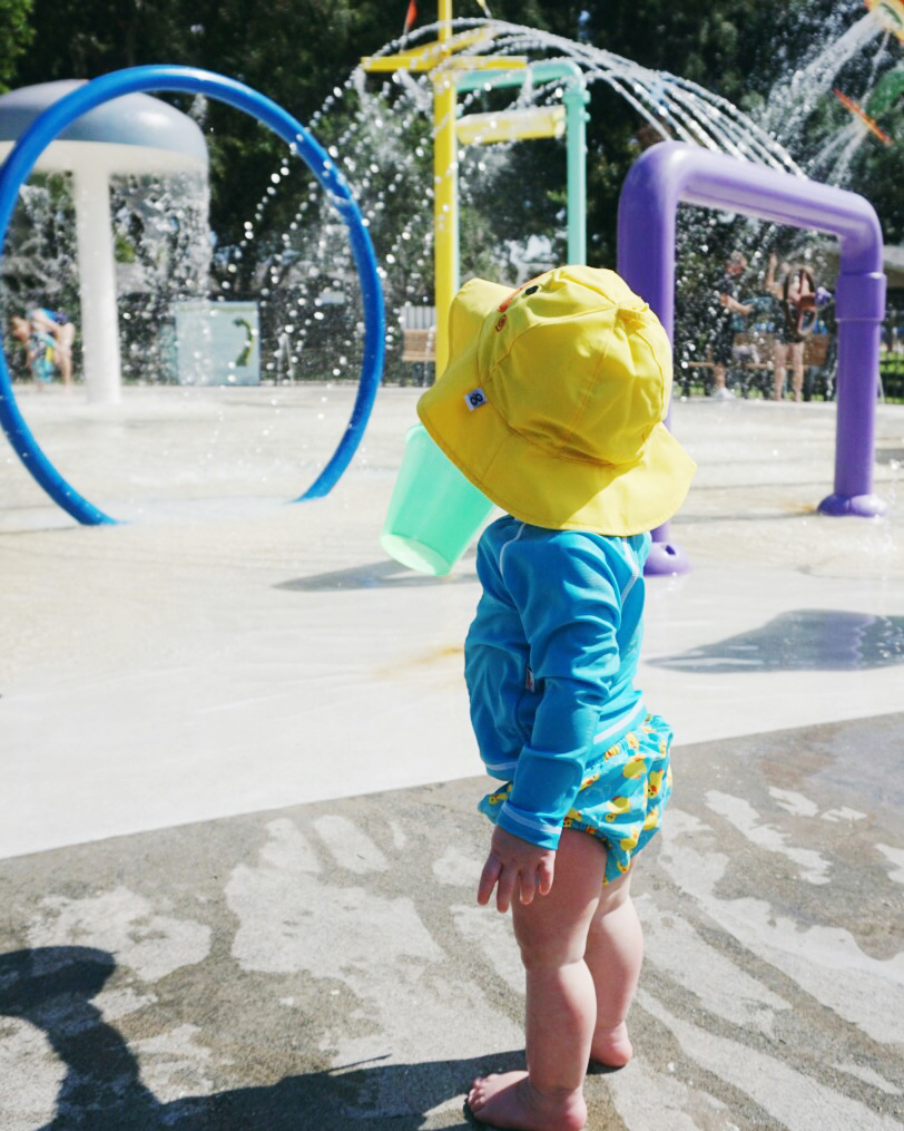 splash pad day must haves, water swim diaper, uva swimwear, swim hat, baby sun hat, swim rash guard, toddler swimwear, sun safe, swim zip, sun hat, baby bathing suit, toddler bathing suit, bathing suit