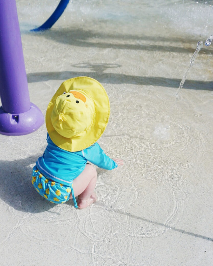 splash pad day must haves, water swim diaper, uva swimwear, swim hat, baby sun hat, swim rash guard, toddler swimwear, sun safe, swim zip, sun hat, baby bathing suit, toddler bathing suit, bathing suit 