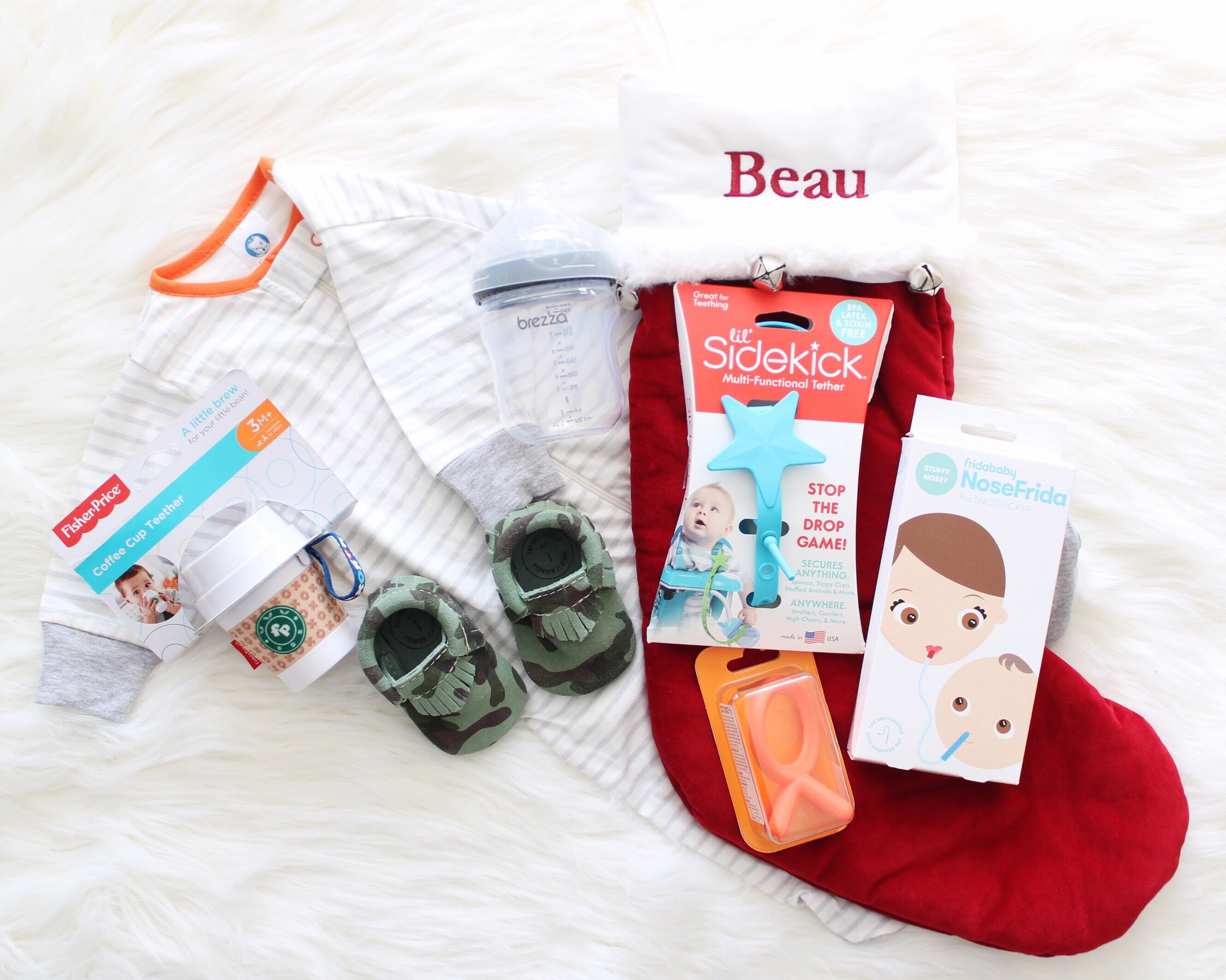 The perfect essentials you need for your Baby's First Christmas! Plus see how to fold onesies like a candy cane! Check it out!