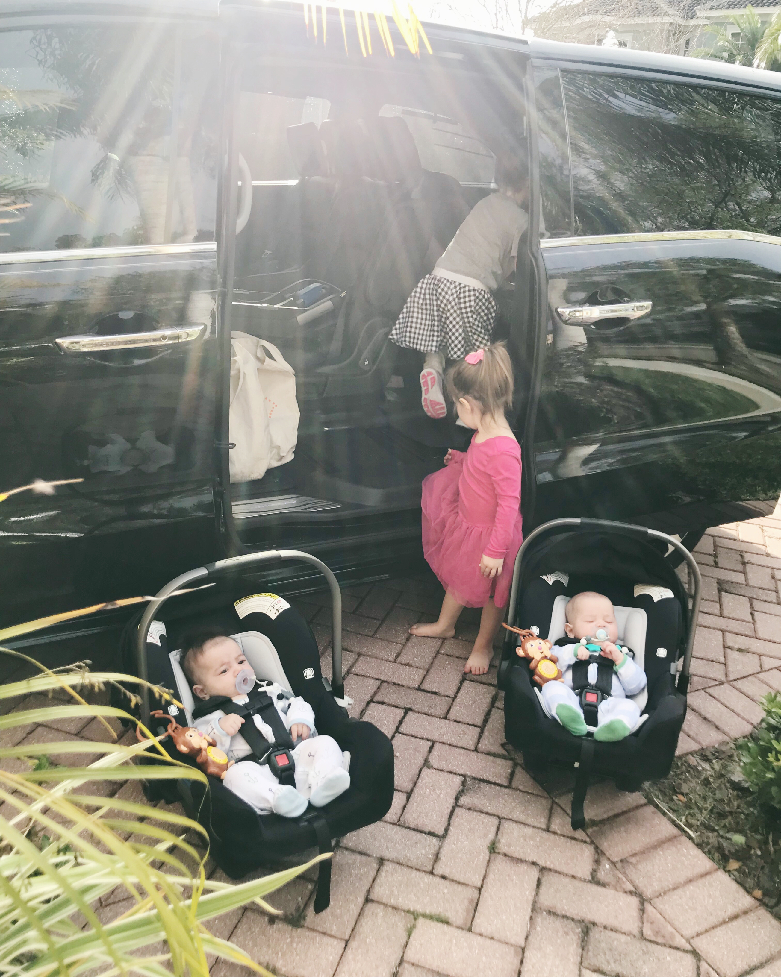 loading twins into minivan 