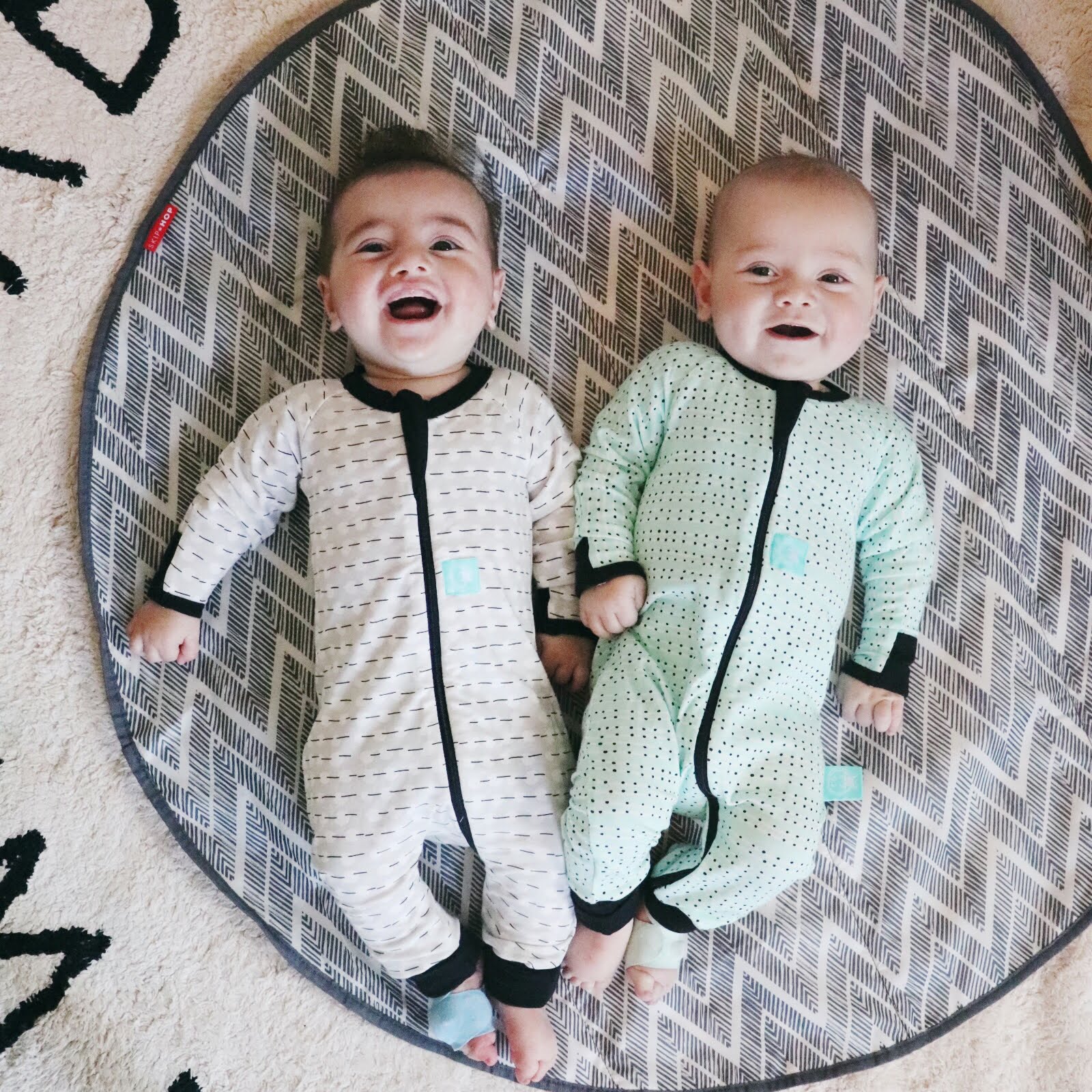 Twins on play mat 