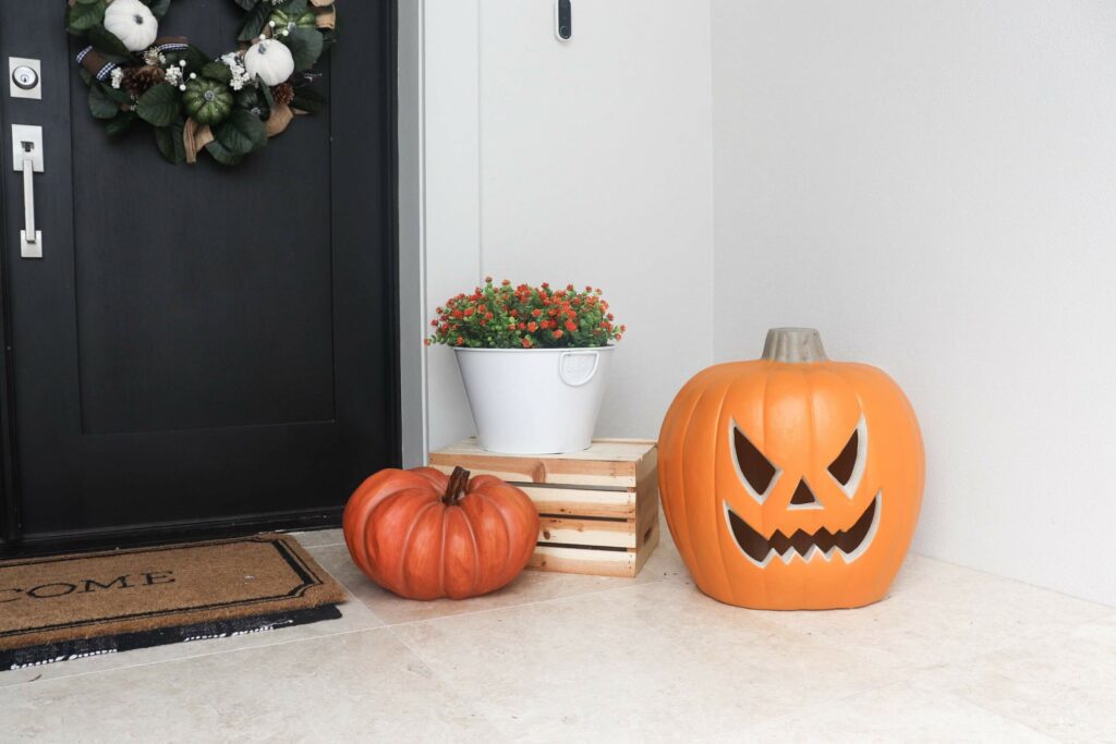 Fall flowers, light up jack-o-lantern, patio ideas