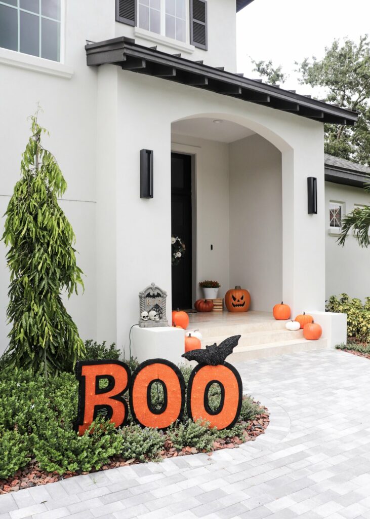 Fall flowers, light up jack-o-lantern, patio ideas, halloween decor