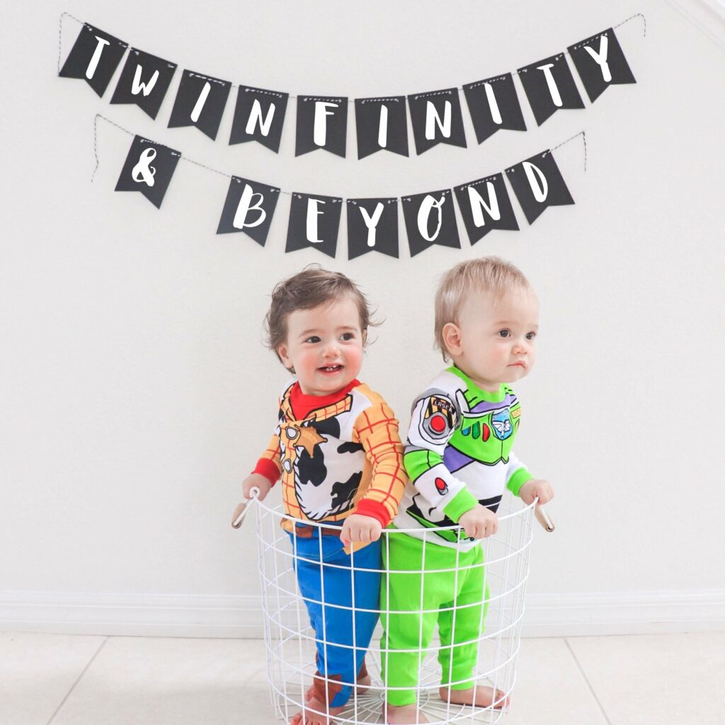 twin babies in halloween costumes