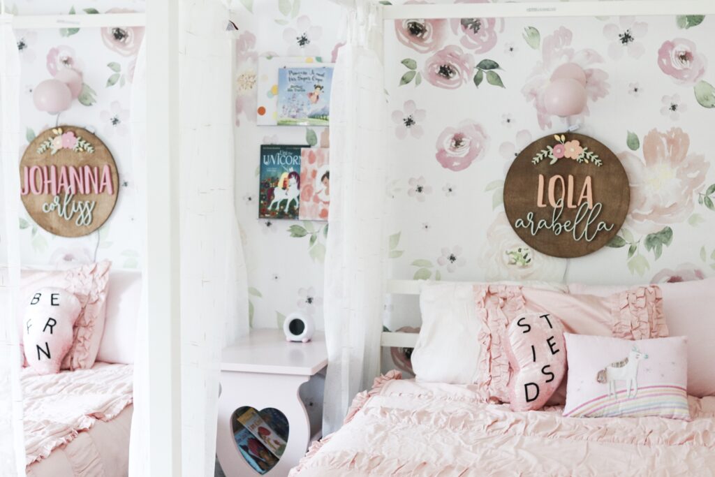 Shared girl room, shared girl room bedroom ideas, shared girl bedrooms, shared girl room, shared tween girl bedroom ideas, shared teenage girl bedroom ideas, sisters bedroom, bedroom storage, bedroom design for girls, shared girl bedroom dividers, shared bedroom organization, shared bedroom layout , floral shared girl room, whimsical shared girl room