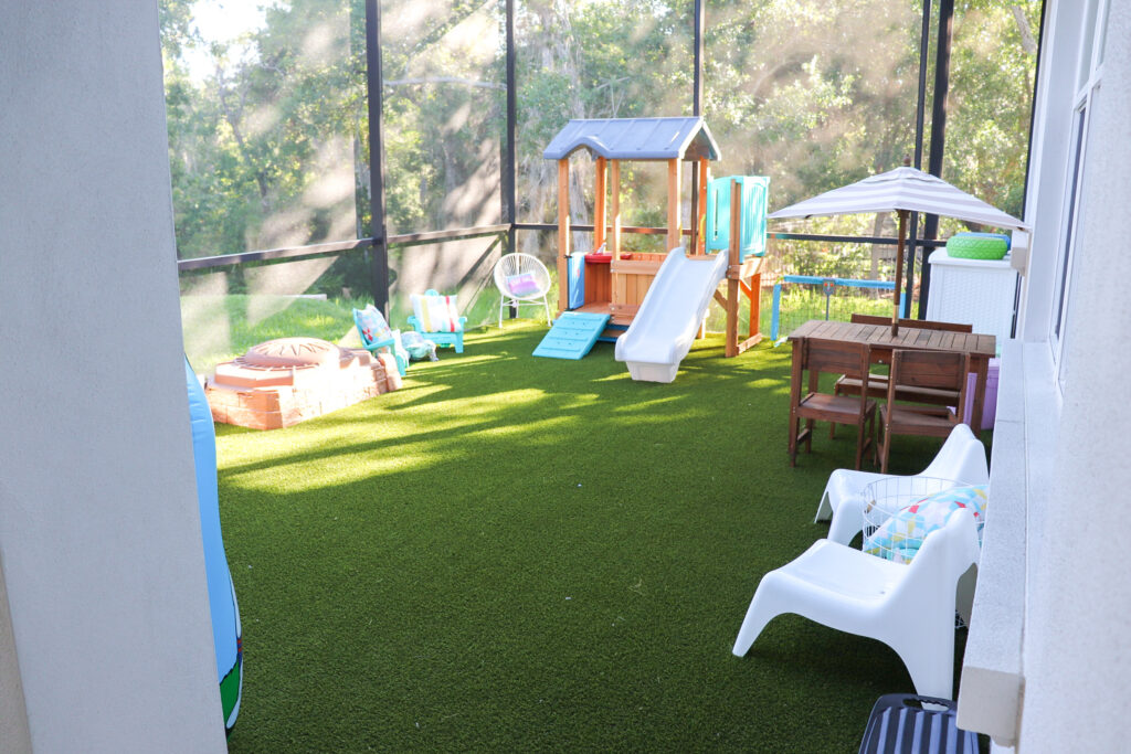 Outdoor Play Area For Kids, artificial turf play area, screened in play area, outside play area for kids, backyard play area for kids, shaded play area for toddlers, toddlers outside play area, mud kitchen