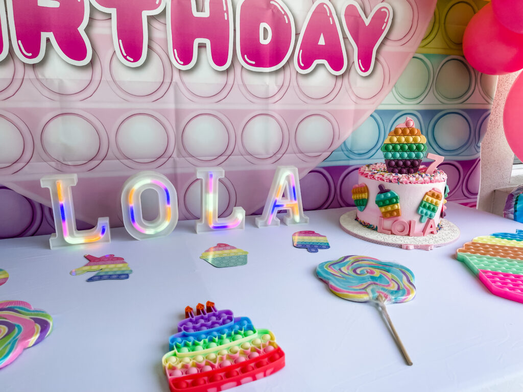 pop it birthday, girl birthday party theme, rainbow birthday theme, unique girl birthday party, pop it party, 7th birthday ideas, party ideas, party for kids, girl party, popits, pop it, large pop it party decor, pop it party decorations, oversized pop it decoration