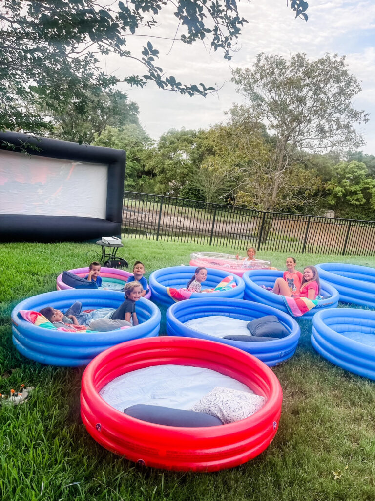 outdoor movie night with kiddie pools