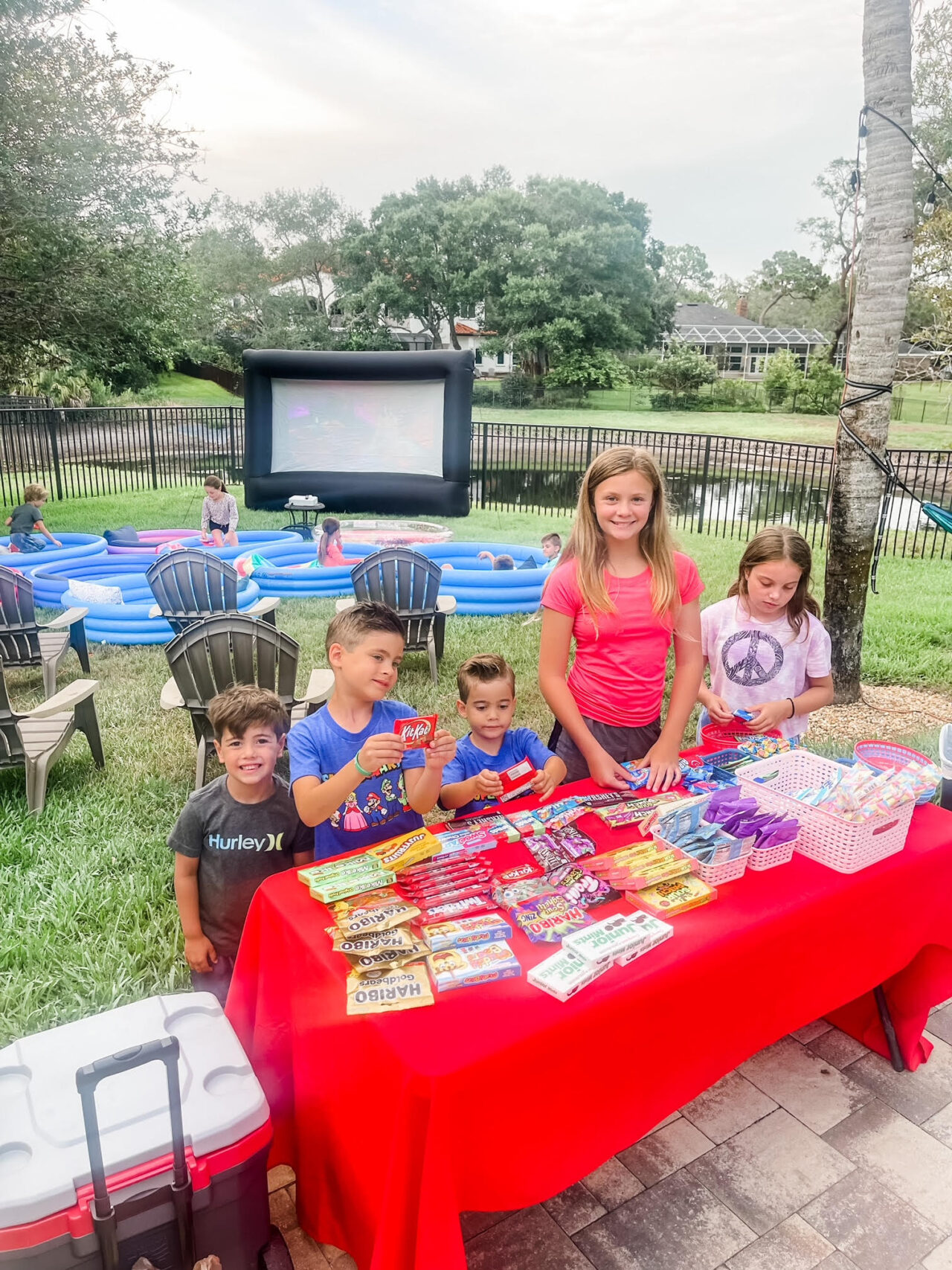 Fun Backyard Outdoor Movie Night with Kiddie Pools