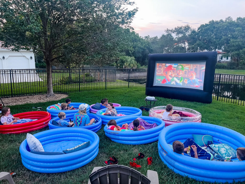 outdoor movie night with kiddie pools