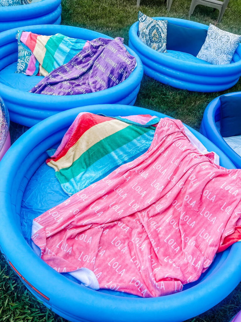 outdoor movie night with kiddie pools