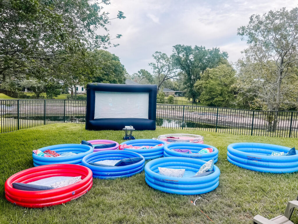 outdoor movie night with kiddie pools