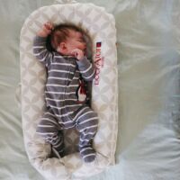 baby essentials, must have baby products, dockatot, addison belle, stokke, baby carrier, newborn sleeper, baby blanket, toddler blanket, organic muslin blanket