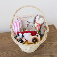 easter basket, easter basket for toddlers, toddler easter basket, toddler gifts, bunny dolls, knit dolls, books for kids, books for toddler, wooden toy, open ended play, easter, basket, toys for toddlers